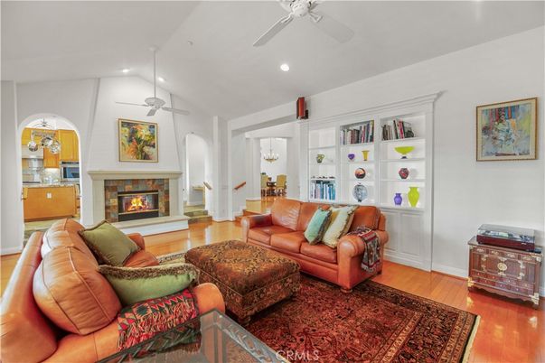 Dining room, Fireplace, Interior, Living room, Recessed Lighting, Wood Texture Flooring