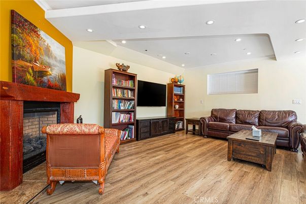 Fireplace, Interior, Living room, Recessed Lighting, Wood Texture Flooring