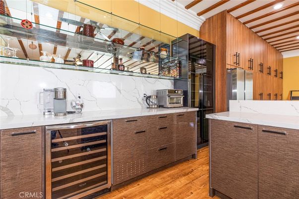 Interior, Kitchen, Marble Walls, Recessed Lighting, Stainless Steel Appliances, Wood Texture Flooring