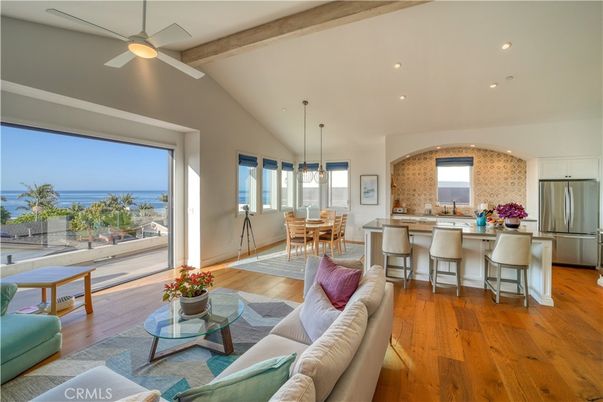 Dining room, Interior, Kitchen, Living room, Pendant Lights, Recessed Lighting, Stainless Steel Appliances, Water, Wooden Beams, Wood Texture Flooring