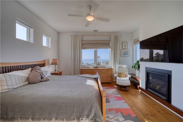 Bedroom, Fireplace, Interior, Water, Wood Texture Flooring