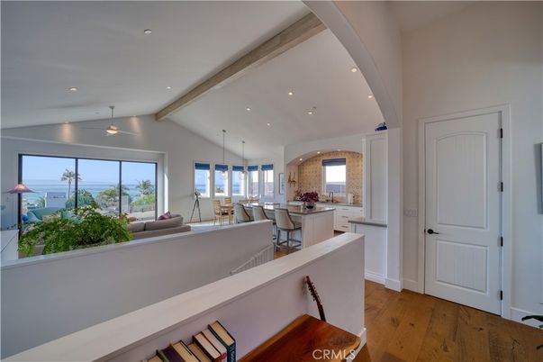 Dining room, Interior, Kitchen, Living room, Pendant Lights, Recessed Lighting, Water, Wooden Beams, Wood Texture Flooring