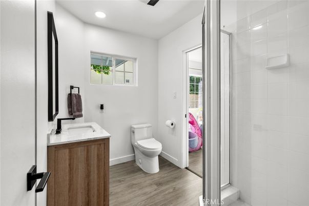 Bathroom, Glass Shower, Interior, Recessed Lighting, Wood Texture Flooring