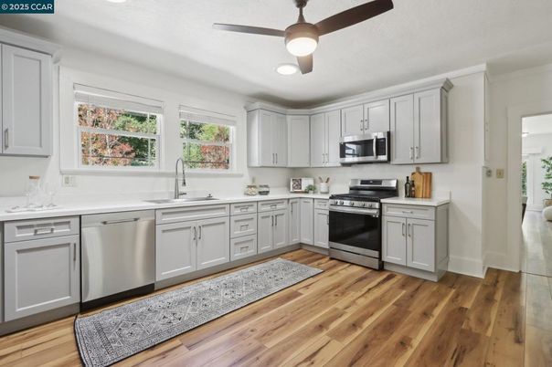 Interior, Kitchen, Recessed Lighting, Stainless Steel Appliances, Wood Texture Flooring