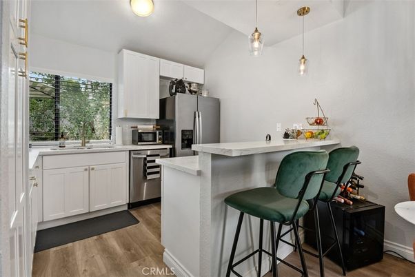Interior, Kitchen, Pendant Lights, Stainless Steel Appliances, Wood Texture Flooring