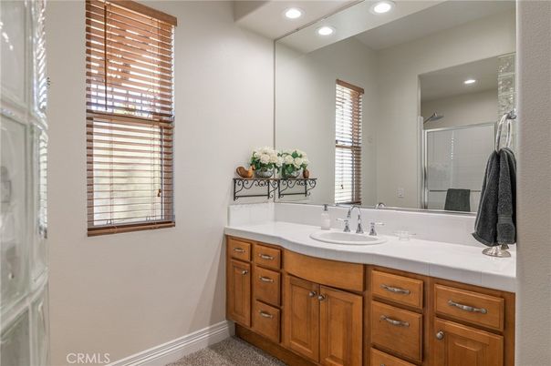 Bathroom, Dual Sink Vanities, Interior, Recessed Lighting, Tile Countertops