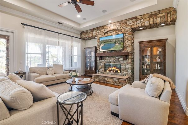 Fireplace, Interior, Living room, Recessed Lighting, Stone Walls, Wood Texture Flooring