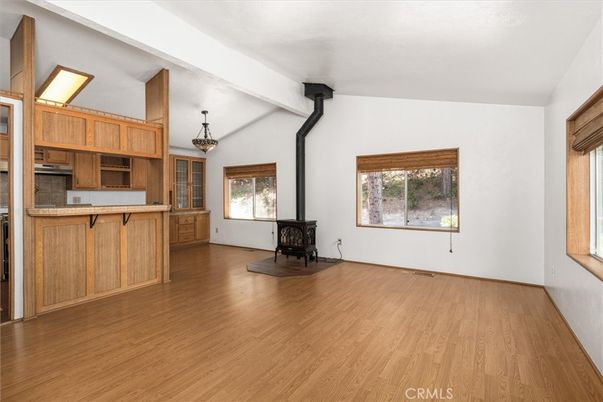 Chandelier, Empty room, Fireplace, Interior, Kitchen, Wood Texture Flooring