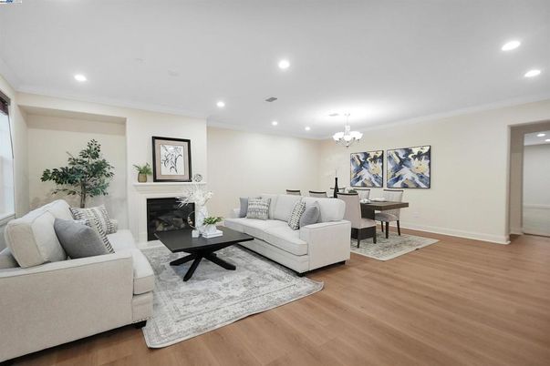 Chandelier, Dining room, Fireplace, Interior, Living room, Recessed Lighting, Wood Texture Flooring