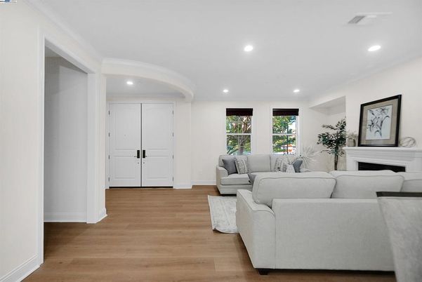 Fireplace, Interior, Living room, Recessed Lighting, Wood Texture Flooring