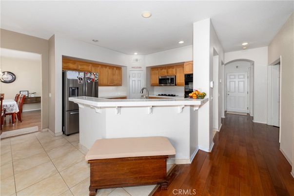 Dining room, Interior, Kitchen, Recessed Lighting, Stainless Steel Appliances, Wood Texture Flooring