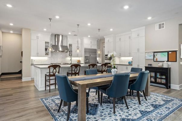 Dining room, Interior, Kitchen, Pendant Lights, Recessed Lighting, Stainless Steel Appliances, Wood Texture Flooring