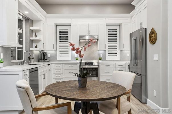 Dining room, Interior, Kitchen, Recessed Lighting, Stainless Steel Appliances, Wood Texture Flooring