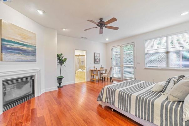 Bedroom, Dining room, Fireplace, Interior, Recessed Lighting, Wood Texture Flooring