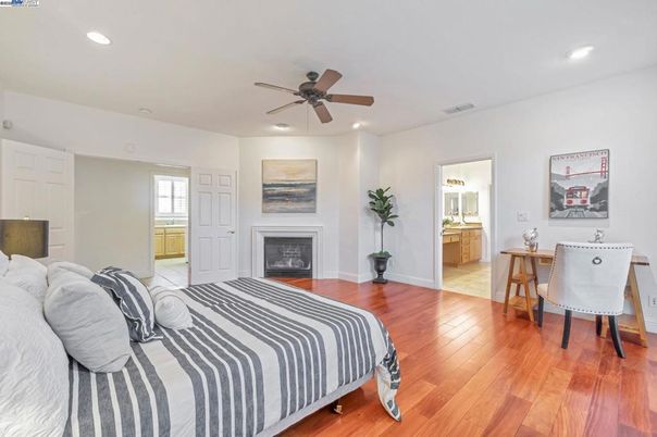 Bedroom, Fireplace, Interior, Recessed Lighting, Wood Texture Flooring