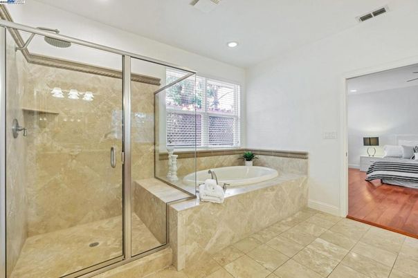 Bathroom, Bedroom, Glass Shower, Interior, Recessed Lighting, Wood Texture Flooring