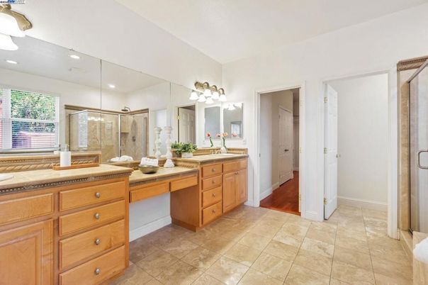 Bathroom, Dual Sink Vanities, Glass Shower, Interior, Recessed Lighting, Wood Texture Flooring