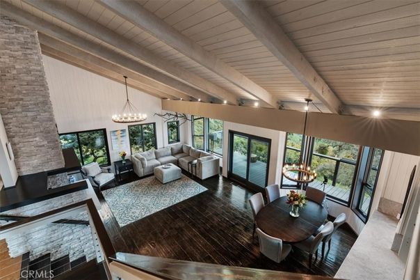 Chandelier, Dining room, Fireplace, Interior, Living room, Pendant Lights, Stone Walls, Wooden Beams, Wooden Ceilings, Wood Texture Flooring