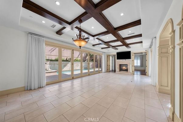 Empty room, Fireplace, Interior, Pendant Lights, Recessed Lighting, Wooden Beams