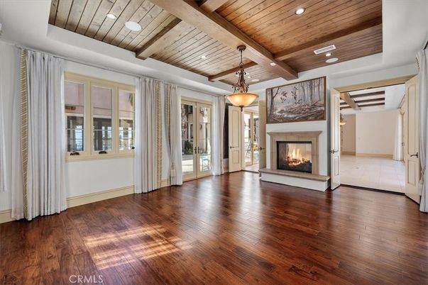 Empty room, Fireplace, Interior, Pendant Lights, Recessed Lighting, Wooden Beams, Wooden Ceilings, Wood Texture Flooring
