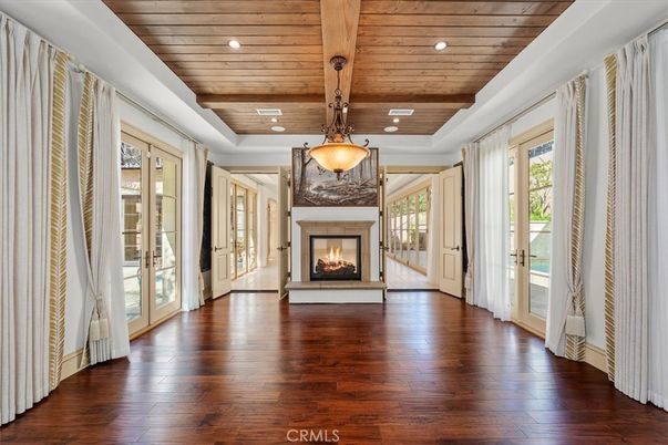 Empty room, Fireplace, Interior, Pendant Lights, Recessed Lighting, Wooden Beams, Wooden Ceilings, Wood Texture Flooring
