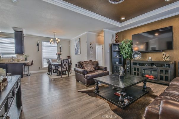 Chandelier, Dining room, Fireplace, Interior, Living room, Recessed Lighting, Wood Texture Flooring