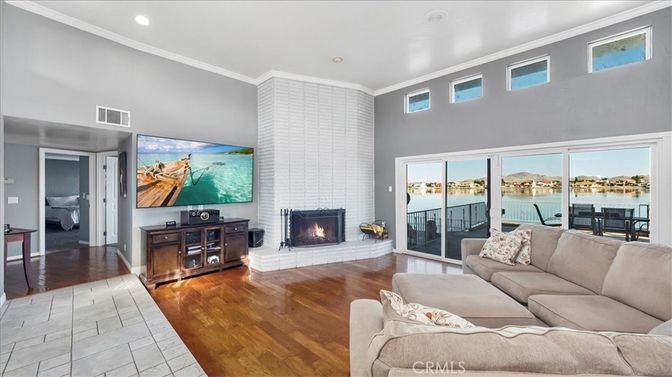 Fireplace, Interior, Living room, Recessed Lighting, Water, Wood Texture Flooring