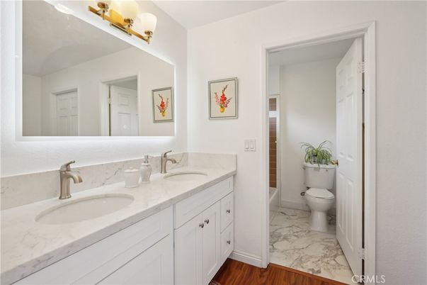 Bathroom, Dual Sink Vanities, Interior, Marble, Wood Texture Flooring