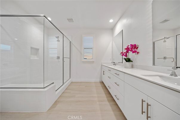 Bathroom, Dual Sink Vanities, Glass Shower, Interior, Recessed Lighting, Wood Texture Flooring