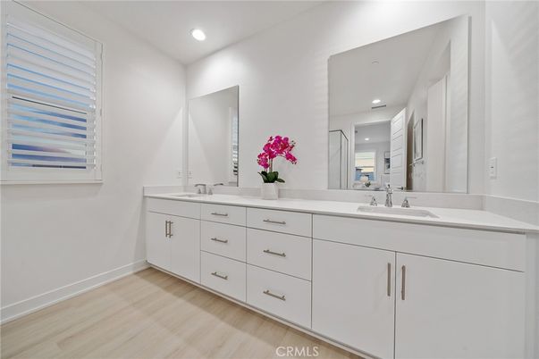 Bathroom, Dual Sink Vanities, Interior, Recessed Lighting, Wood Texture Flooring