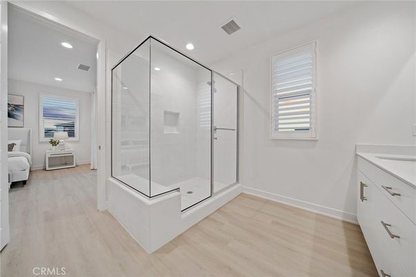 Bathroom, Bedroom, Glass Shower, Interior, Recessed Lighting, Wood Texture Flooring