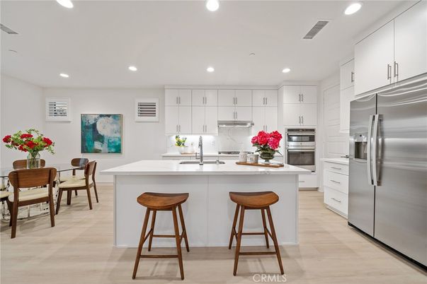 Dining room, Interior, Kitchen, Recessed Lighting, Stainless Steel Appliances, Wood Texture Flooring