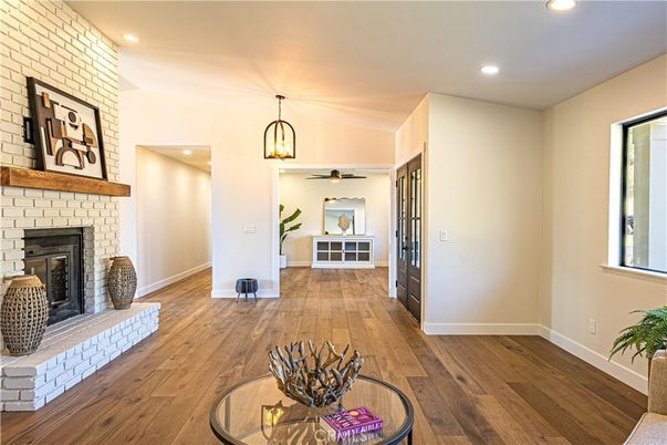 Fireplace, Interior, Pendant Lights, Recessed Lighting, Stone Walls, Wood Texture Flooring