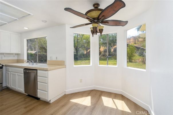 Interior, Kitchen, Recessed Lighting, Tile Countertops, Wood Texture Flooring