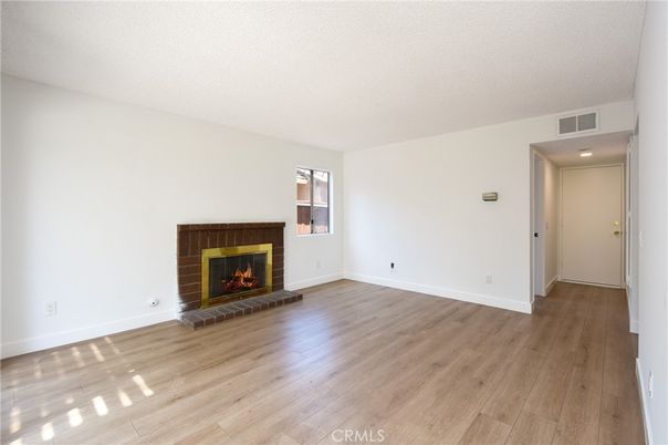 Empty room, Fireplace, Interior, Recessed Lighting, Wood Texture Flooring