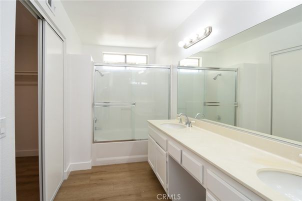 Bathroom, Dual Sink Vanities, Glass Shower, Interior, Wood Texture Flooring