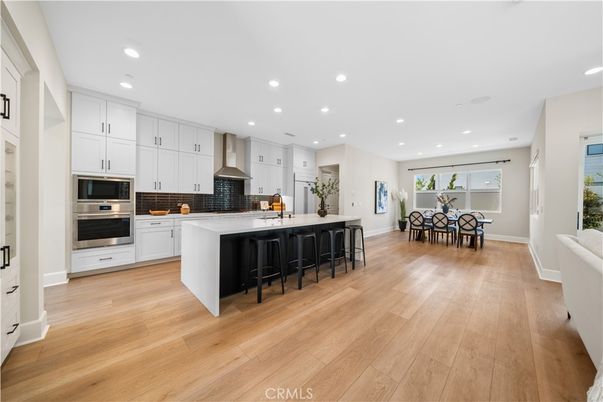 Dining room, Interior, Kitchen, Recessed Lighting, Stainless Steel Appliances, Wood Texture Flooring