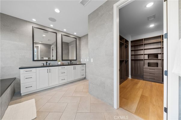 Bathroom, Dual Sink Vanities, Interior, Recessed Lighting, Walk-in Closets, Wood Texture Flooring
