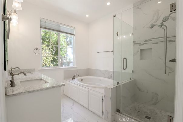 Bathroom, Dual Sink Vanities, Glass Shower, Interior, Marble, Marble Walls, Recessed Lighting