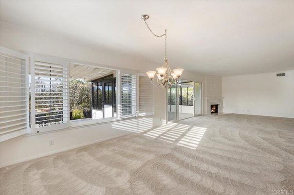 Chandelier, Empty room, Fireplace, Interior