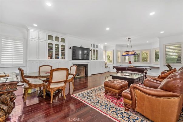 Billiard Table, Dining room, Game Room, Interior, Living room, Pendant Lights, Recessed Lighting, Wood Texture Flooring