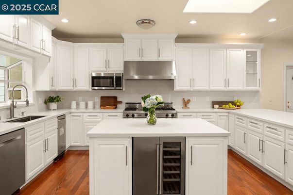 Interior, Kitchen, Recessed Lighting, Stainless Steel Appliances, Wood Texture Flooring
