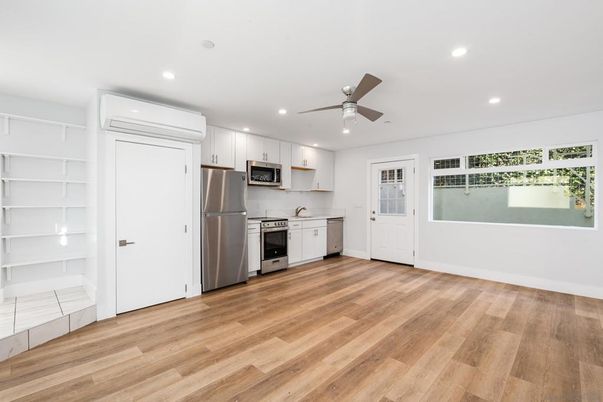 Interior, Kitchen, Recessed Lighting, Stainless Steel Appliances, Wood Texture Flooring