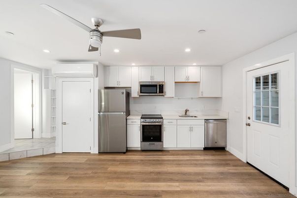 Interior, Kitchen, Recessed Lighting, Stainless Steel Appliances, Wood Texture Flooring