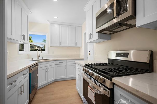 Interior, Kitchen, Recessed Lighting, Stainless Steel Appliances, Wood Texture Flooring