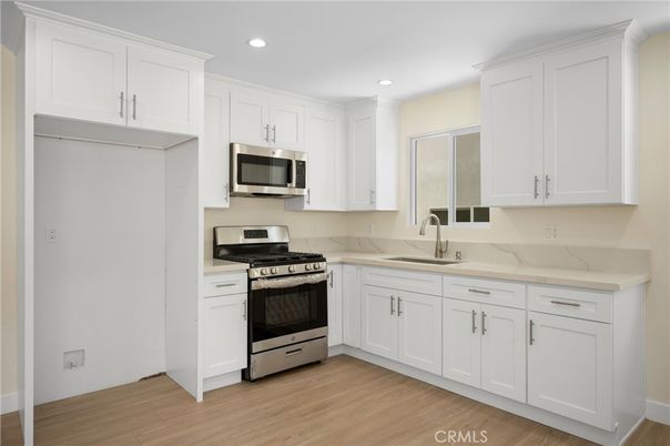 Interior, Kitchen, Recessed Lighting, Stainless Steel Appliances, Wood Texture Flooring
