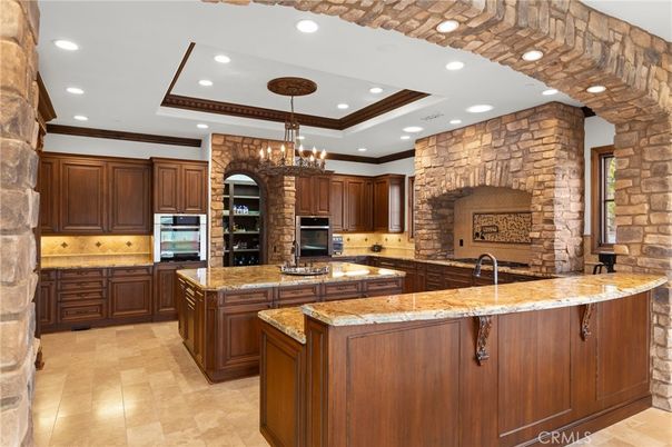 Chandelier, Interior, Kitchen, Recessed Lighting, Stainless Steel Appliances, Stone Walls