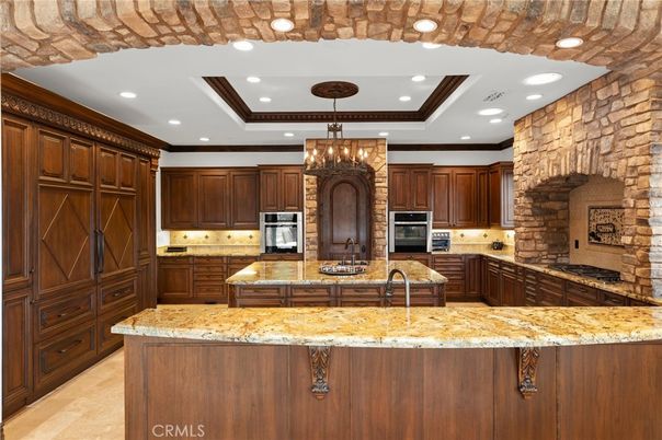 Chandelier, Interior, Kitchen, Recessed Lighting, Stainless Steel Appliances, Stone Walls