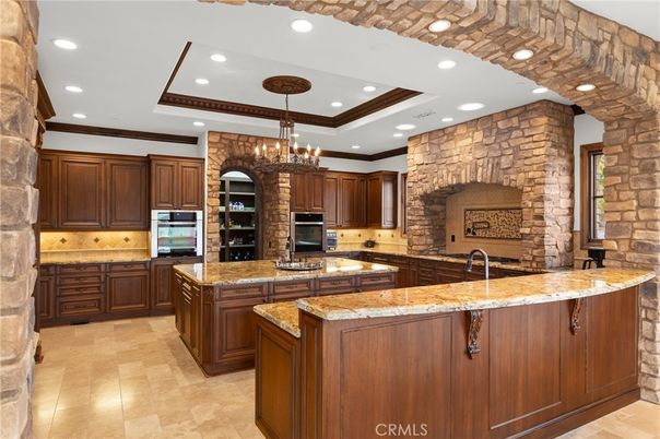 Chandelier, Interior, Kitchen, Recessed Lighting, Stainless Steel Appliances, Stone Walls