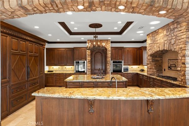 Chandelier, Interior, Kitchen, Recessed Lighting, Stainless Steel Appliances, Stone Walls